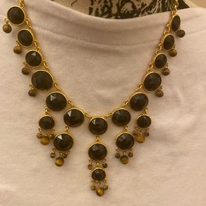 Fun necklace in black and gold ,accented with mini tiger eye beads